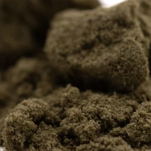 Durban Poison THCa hemp kief full term golden trichome powder with resin rich texture