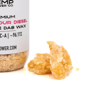 Super Sour Diesel THCA crumble wax concentrate with golden texture and terpene rich appearance